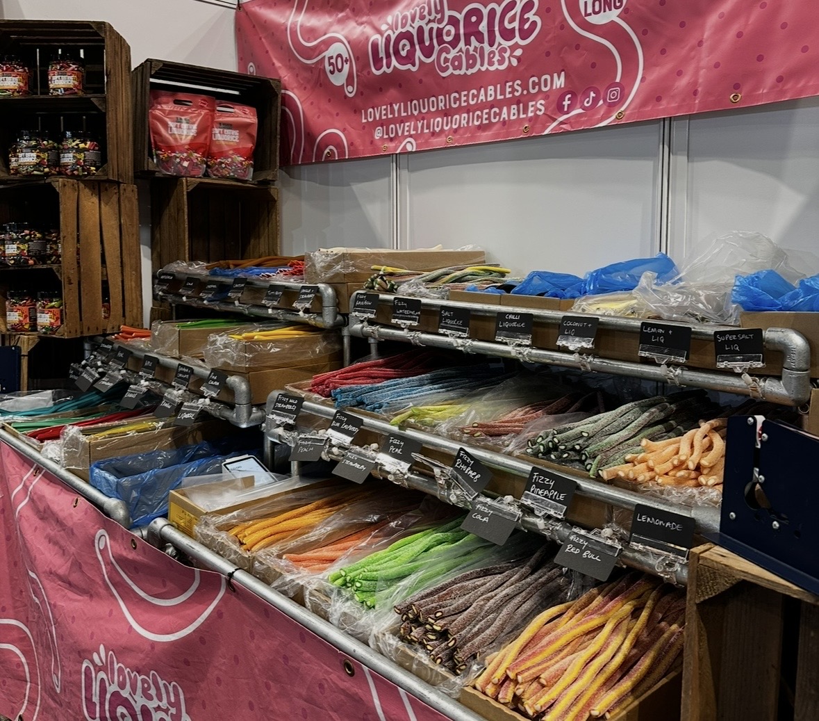 Lovely Liquorice Cables stand at the Winter Good Food Show 2025, with rows of colourful liquorice cables on display.
